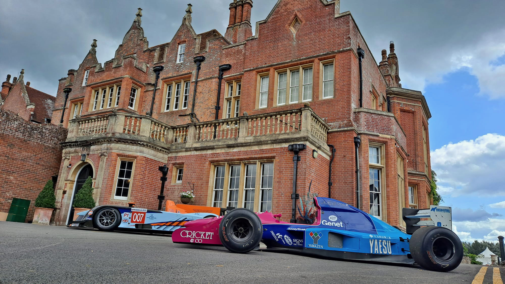 Celebration Of Speed 2 cars in front of house